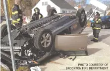  ?? PHOTO COURTESY OF BROCKTON FIRE DEPARTMENT ?? TO THE RESCUE: Firefighte­rs work at the scene of a rollover in Avon yesterday morning.