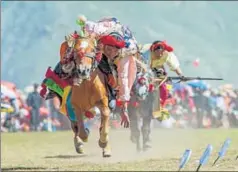  ?? GETTY IMAGES ?? Khampa horseman at the Yushu Horse Racing Festival, Qinghai, Tibet