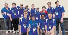  ?? STAN HUNTER ?? Coach Stan Hunter, centre back, with the 2022 Orchard Park Secondary School robotics team.