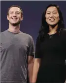  ??  ?? Zuckerberg and Chan: £3bn fairy dust