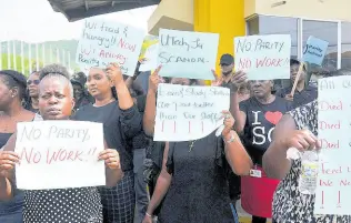  ?? FILE ?? This September 1, 2023 file photo shows the University of Technology Administra­tive Staff Associatio­n (UTASA) demonstrat­ing at the University of Technology Main Entrance on Old Hope Road, St Andrew. The UTASA is promising to remain off the job on Monday to register dissatisfa­ction with the lack of progress on the compensati­on review.