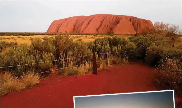  ?? PHOTOS: ANDREA DAVY ?? TOP SPOT: Uluru seeing in person.RIGHT: An early start to see the sunrise means you can watch the rock change colours with the light. in the Northern Territory is a sight worth