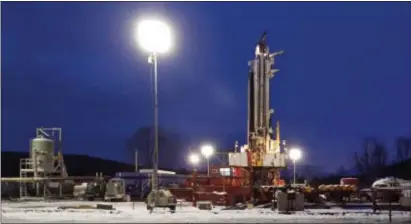  ?? ASSOCIATED PRESS ?? This file photo shows a natural gas drilling site in New Milford, Pa. The state Senate is pushing for a new severance tax on the state’ natural gas drillers, but it has failed to get a vote by the full House.