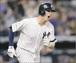  ?? KATHY WILLENS – THE ASSOCIATED PRESS ?? The New York Yankees’ Greg Bird reacts after hitting a solo home run against Cleveland in the seventh inning in Game 3 of their American League Division series.