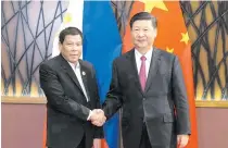  ??  ?? Xi Jinping meets Duterte during the Belt and Road Forum (BRF) for Internatio­nal Cooperatio­n at the Great Hall of the People in Beijing on May 15, 2017.