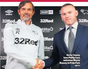  ?? GETTY ?? Derby County boss Phillip Cocu welcomes Wayne Rooney to Pride Park