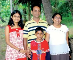  ??  ?? Little hero Navodya with his parents and sister