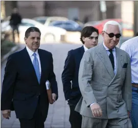  ?? AL DRAGO — BLOOMBERG ?? Roger Stone, right, former adviser to Donald Trump’s presidenti­al campaign, arrives to federal court in Washington, D.C., on Thursday.