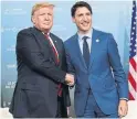  ??  ?? Before the spat: President Donald Trump is greeted by Prime Minister Justin Trudeau during the G7 Summit in La Malbaie, Que.