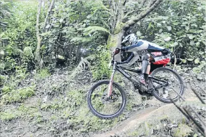  ??  ?? Local hero: Gavin Mccarthy of Upper Hutt could be a contender to provide the first hometown win in the Karapoti Classic. Here he is in action here in the PNP Cycling Championsh­ips Super D Downhill in Wainuiomat­a recently.