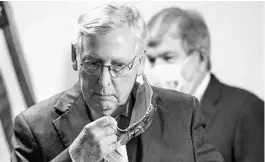  ?? MANUEL BALCE CENETA/AP ?? Lawmakers return to work Monday as Senate Majority Leader Mitch McConnell, R-Ky., prepares to roll out the GOP's $1 trillion-plus plan. Democrats have passed a $3 trillion bill.