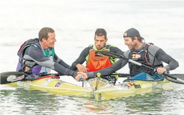  ?? /John Hishin/Gameplan Media ?? By hell or high water: Winner of the Berg River Canoe Marathon Adrián Boros, centre, flanked by runner-up Graeme Solomon, right, and third-placed Petr Mojzisek.