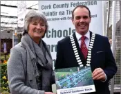  ??  ?? Dr Mary Stack presented Cllr Hurley with a copy of the Cork Schools Garden Book at the launch.