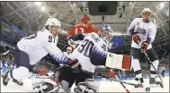  ?? BRUCE BENNETT — THE ASSOCIATED PRESS ?? NHL players stayed home from the Olympics in Pyeongchan­g. The United States lost to Russia in a preliminar­y game on Saturday.