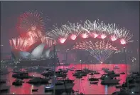  ??  ?? SPARKLING: Fireworks explode over the Opera House in Sydney.