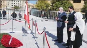  ??  ?? A handout picture provided by the Lebanese photo agency Dalati and Nohra shows Lebanon’s prime minister-designate, Saad Hariri, his aunt, MP Bahia Hariri (right), and uncle Shafiq, praying at the gravesite of his father, slain prime minister Rafik Hariri, in downtown Beirut, yesterday.