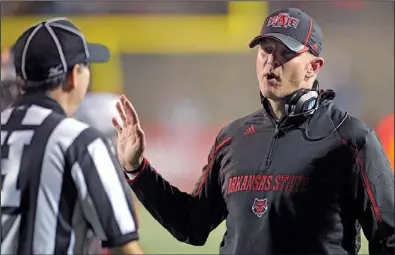  ?? AP/G.M.ANDREWS ?? Arkansas State Coach Bryan Harsin opted to return home to Boise, Idaho, on Wednesday when he replaced Chris Petersen as the coach of the Broncos. His replacemen­t will be the fifth coach in five seasons for the Red Wolves.