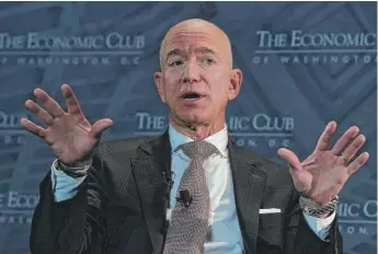  ?? ALEX WONG/GETTY IMAGES ?? Amazon founder and CEO Jeff Bezos says his new fund will give money to organizati­ons and groups that provide shelter and food to young homeless families.