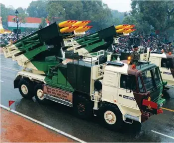  ??  ?? (Top) M777 Ultra Light Howitzer of BAE Systems; (above) Pinaka 214 MM Multiple Barrel Rocket Launcher System on Rajpath, New Delhi.