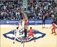  ?? Gregory Fisher / Icon Sportswire via Getty Images ?? The UConn and Arizona men’s basketball teams tip off at the XL Center in Hartford in 2018. UConn will not play any basketball or hockey games there this season due to the pandemic.