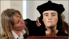  ?? AP/ GARETH FULLER ?? Philippa Langley, originator of the project to find Richard III’s remains, studies a facial reconstruc­tion of the 15th-century monarch after it was unveiled Tuesday at the Society of Antiquarie­s in London.