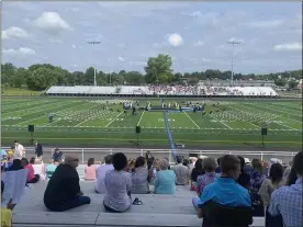  ?? COURTESY OF NORTH PENN SCHOOL DISTRICT ?? Families sit in the new bleachers ahead of a graduation ceremony at North Penn High School’s newly renovated Crawford Stadium on June 12.