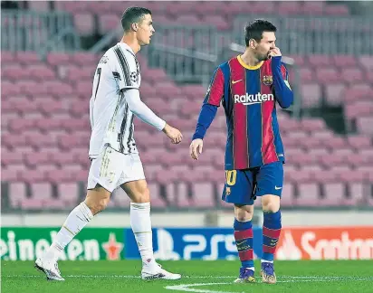  ??  ?? Geht es nach den Super-League-Plänen, sollen Ronaldo und Messi noch öfter gegeneinan­der spielen.