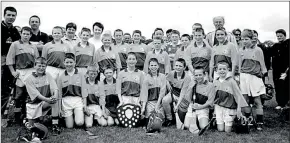  ??  ?? The victorious St Catherines U12 C hurling team with mentors in 2002, Kieran Morrison, Pat Clancy, Alice Aherne, Assumpta Mangan and Dick Morrison.