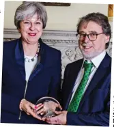  ??  ?? Pioneering: Mrs May with Professor Peter Hindmarsh