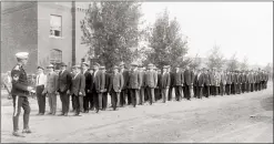  ?? PHOTO COURTESY OF THE ESPLANADE ARCHIVES. ?? Men of the 10th Battalion in front of Armoury before heading out to training camp. Earl appears to be in the front row in the nearest column.