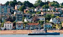  ??  ?? Shipshape: Gurnard Bay near Cowes on the island