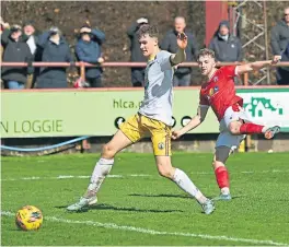  ?? ?? Grady Mcgrath, right, scores Brechin City’s first goal against Forres Mechanics at Glebe Park.