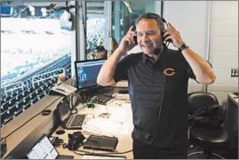  ?? CHRIS SWEDA/CHICAGO TRIBUNE ?? Bears play-by-play announcer Jeff Joniak prepares in the booth before the start of a preseason game at Soldier Field in 2019.