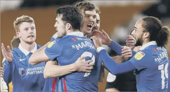  ?? Picture: Daniel Chesterton/phcimages.com ?? PARTY TIME
Pompey savour their opening goal in last night’s 2-0 victory away to fellow League One promotion hopefuls Hull City.