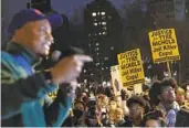  ?? YUKI IWAMURA AP ?? A person speaks during a protest at Washington Square Park Saturday in New York.