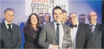  ??  ?? Andrew Lewis, managing director of Westcombe, with the trophy for Manufactur­er of the Year Awards 2018.