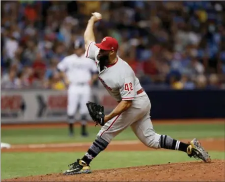  ?? CHRIS O’MEARA — THE ASSOCIATED PRESS ?? Phillies reliever Luis Garcia delivers a pitch during the seventh inning of a Sunday’s win over the Tampa Bay Rays.