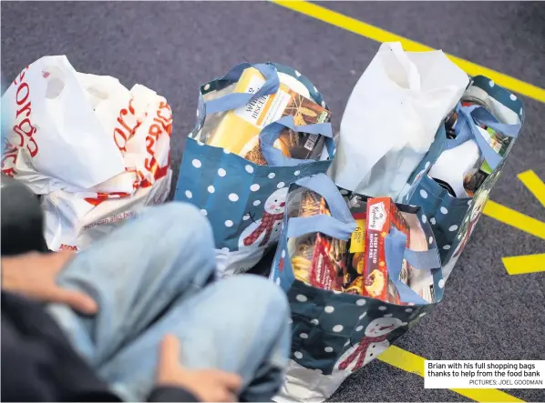  ?? PICTURES: JOEL GOODMAN ?? Brian with his full shopping bags thanks to help from the food bank