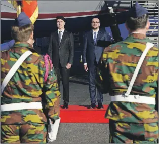  ?? CP PHOTO ?? Prime Minister Justin Trudeau is greeted by Belgium Prime Minister Charles Michel as he arrives in Brussels, Belgium, Wednesday to attend the NATO Summit.