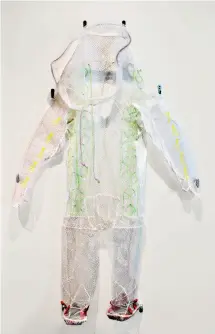  ??  ?? BELOW Atauchikun tatqiġmuqt­a! (Let’s All Go To the Moon Together!) Space Suit 2016 Plastic, felt, fishing line, cotton thread and beads 218.4 × 162.6 × 12.7 cm