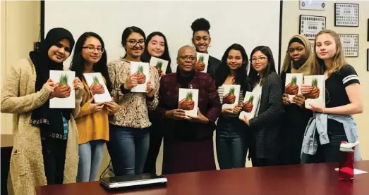  ?? Photo courtesy Sen. Bernard’s office ?? Thomas-Bernard with staff and students working in the Colour Me Truth group on anti-racism and anti-oppression at Sir Wilfrid Laurier Collegiate in Scarboroug­h, Ont.