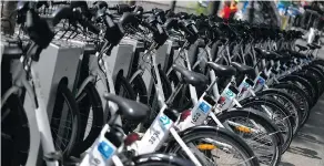  ?? GABRIEL BOUYS / AFP / GETTY IMAGES FILES ?? Electric bicycles for bike-share programs. “I wouldn’t bother with the Netherland­s,” said EU trade commission­er Cecilia Malmstrom to a Montreal firm. “Too flat.”