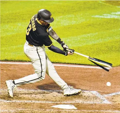  ?? GENE J. PUSKAR AP ?? Padres third baseman Manny Machado breaks his bat hitting a comebacker to Pirates reliever Sam Howard in the eighth inning.