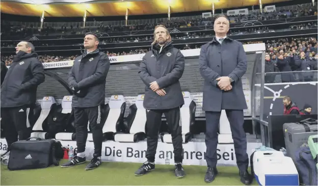  ?? PICTURE: JAMES MARSH/BPI/SHUTTERSTO­CK ?? 0 Austin Macphee, third left, stands alongside Michael O’neill with whom he worked in the Northern Ireland set-up