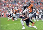  ?? ERIC LUTZENS / The Denver Post ?? Ex-bears cornerback Kyle Fuller intercepts a pass during a 2019 game against the Broncos at Empower Field at Mile High in Denver.