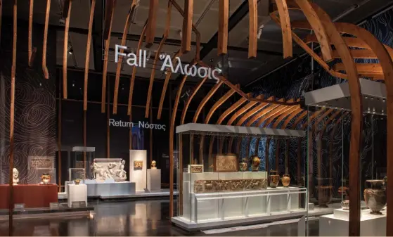  ??  ?? Below: Framing at the end of the main gallery in the British Museum exhibition evokes the wooden horse that helped bring ten years of siege at Troy to an end