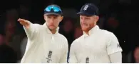  ?? (AFP) ?? England’s captain Joe Root (left) with teammate Ben Stokes.