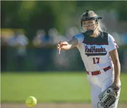  ?? VINCENT D. JOHNSON / DAILY SOUTHTOWN ?? Marist’s Brooke McNichols pitches against Lincoln-Way East during the Class 4A Marist Supersecti­onal.