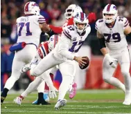  ?? Photo: AFP ?? Quarterbac­k Josh Allen, of the Buffalo Bills, surges upfield during their away victory over the New England Patriots in the NFL.