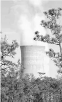  ?? STEPHEN M. DOWELL/ORLANDO SENTINEL 2009 ?? Steam rises from the cooling towers at OUC’s coal-burning facility, Stanton Energy Center in Orlando.